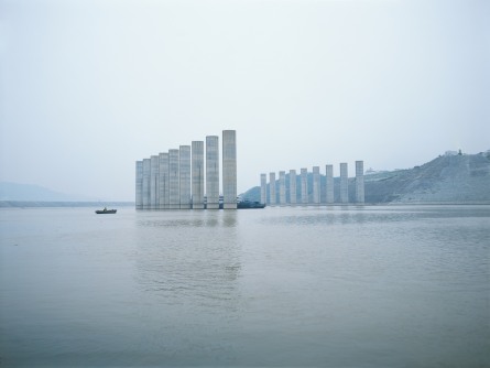 Still form Lock 2006 of industrial chimneys within a large body of water