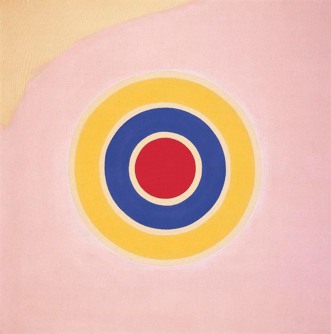 A set of concentric circles in yellow, pale yellow, blue, red, and white sits on a pink and yellow background