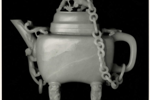 White sculpture of a covered ewer